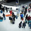 Travelers gather at baggage claim station at Newark International Airport in Newark in March.
