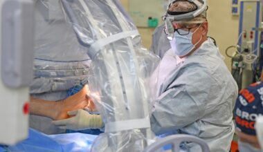 VA surgeon operates on patients in naval facility