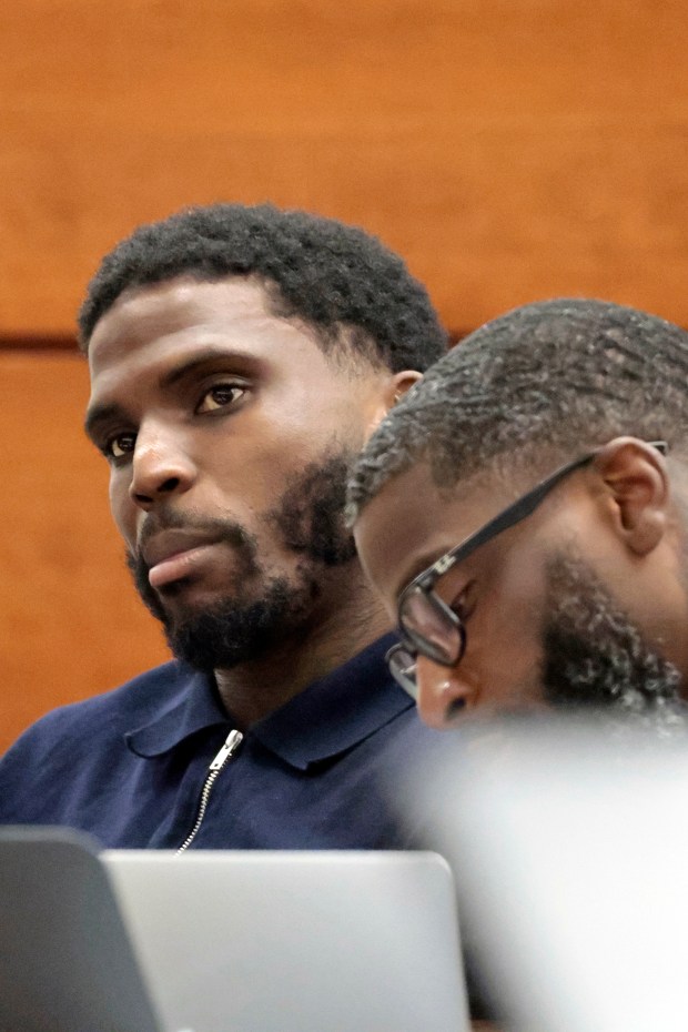 Former Miami Dolphins wide receiver Tyreek Hill is shown at the defense table as his trial opens at the Broward County Courthouse in Fort Lauderdale on Thursday, May. 7, 2026. A lawsuit brought by Sophie Hall, a social media influencer and model, claims that Hill intentionally broke her leg during a backyard football lesson at his Southwest Ranches home. Her attorneys are suing Hill for battery, assault, intentional infliction of emotional distress, and negligence. (Amy Beth Bennett / South Florida Sun Sentinel)