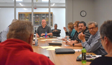 Rob Thomas (third from left) and Mark Sorrill (second from right) attend a City Council workshop meeting.