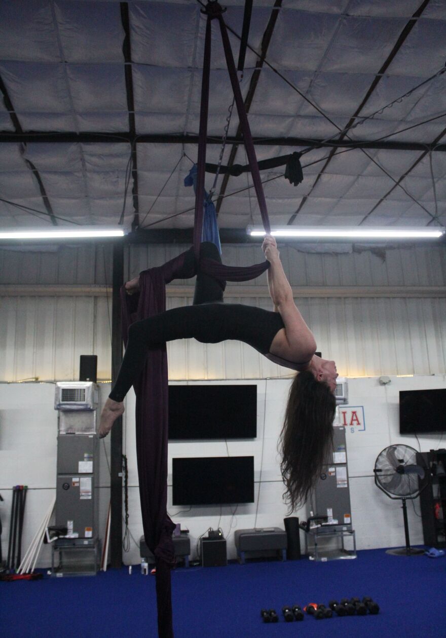 Fit to Fly aerialist Terri Davenport will perform during The Back Lot: Rave & Rock Circus on Friday night.