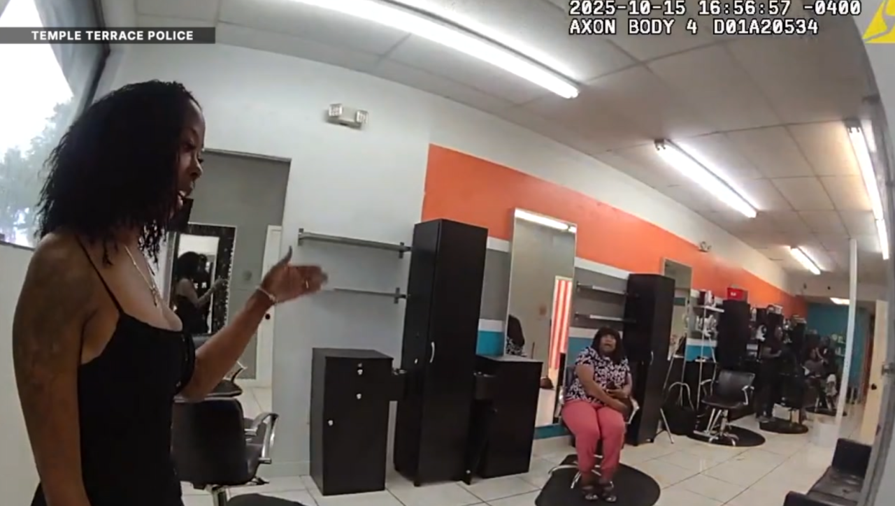 Body camera video shows the salon owner and customer in salon as officers arrived