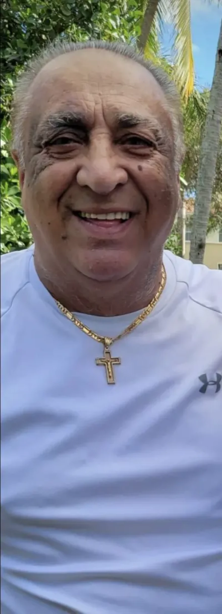 Headshot of man with cross