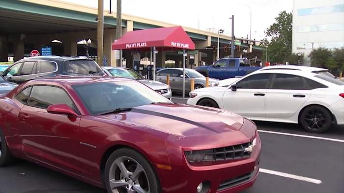 Businesses react to Orlando parking hike