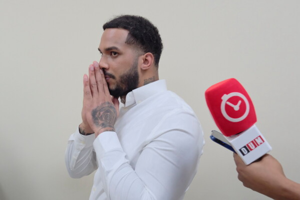 Tampa Bay Rays shortstop Wander Franco gestures in court at the end of his trial on charges of sexually abusing a minor in Puerto Plata, Dominican Republic, Monday, May 25, 2026. (AP Photo/Ricardo Hernandez)