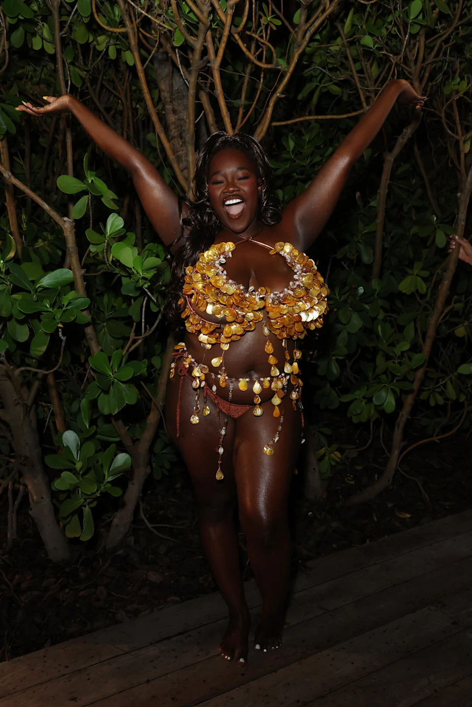 Achieng Agutu attends Sports Illustrated Swimsuit Runway Show.