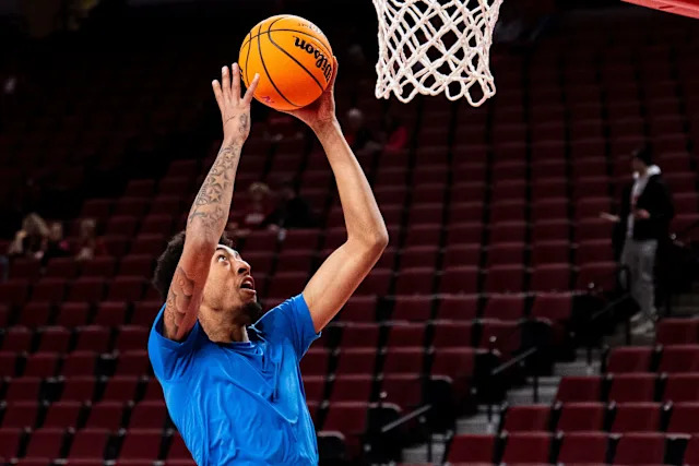 Jan 4, 2025; Lincoln, Nebraska, USA; UCLA Bruins forward Devin Williams (22) warms up before the game against the Nebraska Cornhuskers at Pinnacle Bank Arena. Mandatory Credit: Dylan Widger-Imagn Images