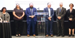 Local clergy honor the memories of the six million Jews who were murdered during the Holocaust. Left to right: Hazzan Jodi Sered-Lever, Rabbi Rachel Blatt, Rabbi Michael Weiss, Rabbi Joel Simon, Rabbi Jason Rosenberg and Cantor Deborrah Buchman.