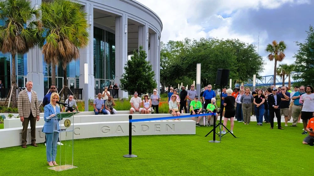 Mayor Donna Deegan speaking in the Riverfront Music Garden