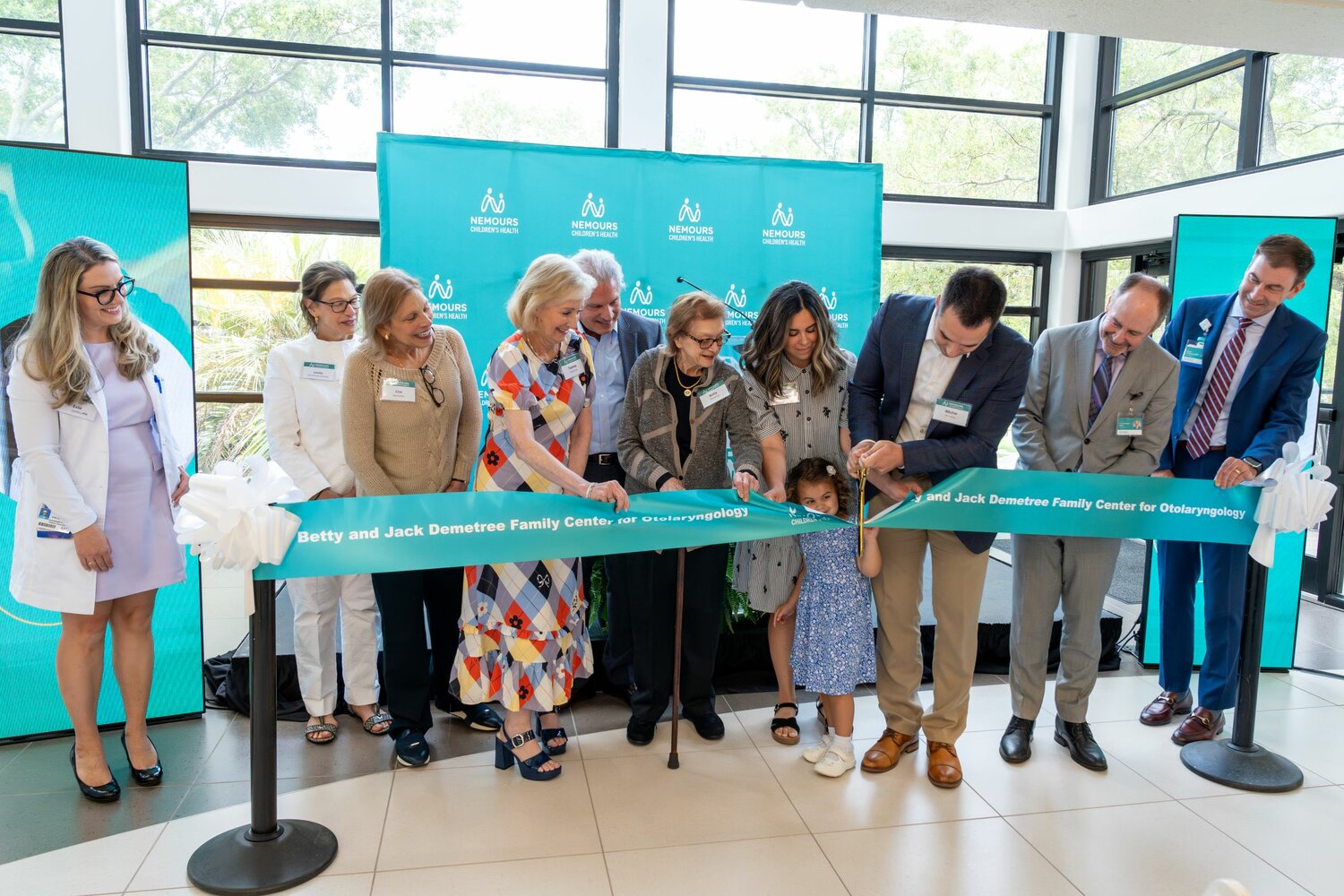 Cutting the ribbon on the new Betty and Jack Demetree Family Center for Otolaryngology