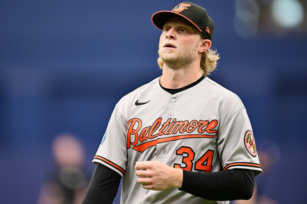 Shane Baz #34 of the Baltimore Orioles walks back to the dugout in the middle of the third inning against the Tampa Bay Rays at Tropicana Field on May 20, 2026 in St Petersburg, Florida. 
