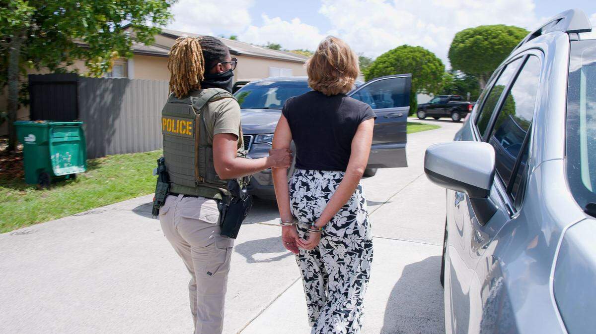 An Immigration and Customs Enforcement agent detains Adys Lastres Morera in Miami. Lastres Morera is the sister of Guillermina Lastres Morera, the general who runs GAESA, the military conglomerate that runs most of Cuba’s economy. An Immigration and Customs Enforcement agent detains Adys Lastres Morera in Miami. Lastres Morera is the sister of Guillermina Lastres Morera, the general who runs GAESA, the military conglomerate that runs most of Cuba’s economy.