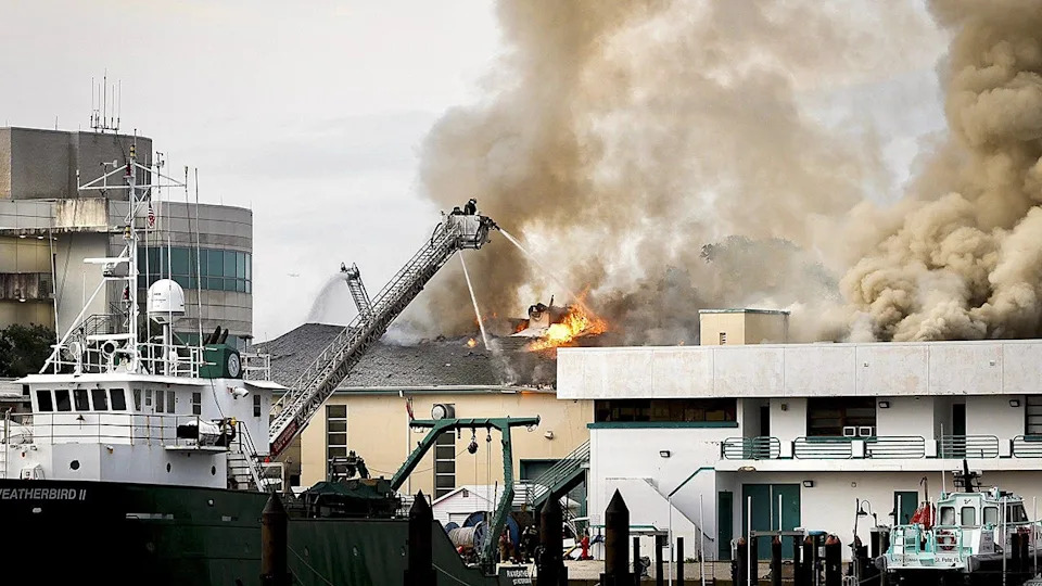 Firefighters extinguishing fire on University of South Florida campus in St. Petersburg