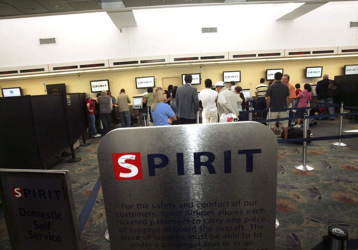 In 2007, passengers at the check-in area for Spirit Airlines in Terminal 4 at Fort Lauderdale-Hollywood International Airport. The airline was expanding from 24 to 35 counter positions.