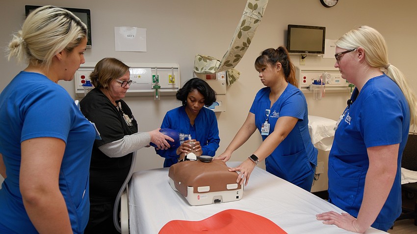 Nurses from local hospitals train with medical manikins at Jacksonville University’s Healthcare Simulation Center. Nurses from local hospitals train with medical manikins at Jacksonville University’s Healthcare Simulation Center.