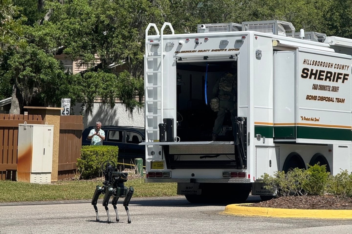 The Hillsborough County Sheriff's Office responds to a neighborhood close to the University of South Florida campus, Friday, April 24, 2026 in Tampa, Fla.