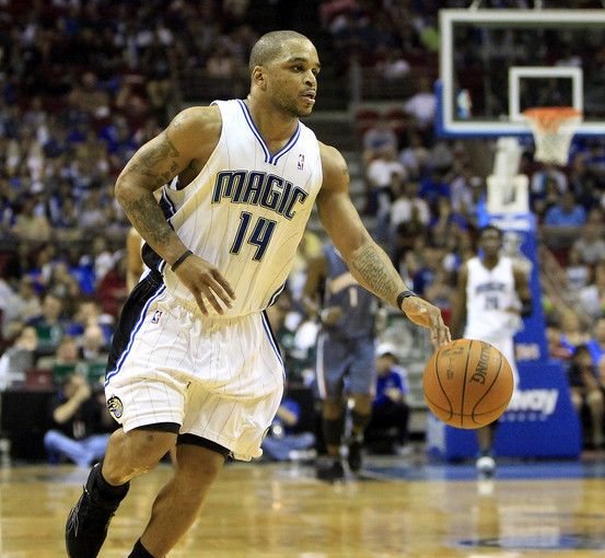 Orlando Magic guard Jameer Nelson brings the ball up the court in the first quarter of the NBA game between the Orlando Magic and the Charlotte Bobcats at Amway Arena in Orlando.