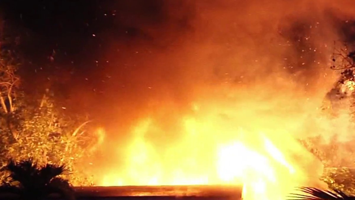 Crews battle RV fire that spread to home in NW Miami-Dade – NBC 6 South Florida