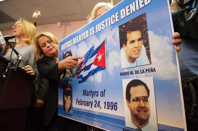 Marco Rubio, Florida Congressional Reps, Hold Press Conference On New US-Cuba Policy Rep. Ileana Ros-Lehtinen points to a poster with pictures of those lost from the group called 'Brothers to the Rescue' when they were shot down by Cuban fighter jets in 1996. Senator Marco Rubio and other congressional people addressed the decision by President Barack Obama to change the Unites States Cuba policy. The press conference was held to denounce the changes to U.S.-Cuba policy by the Obama admisnistration. (Photo by Michele Eve Sandberg/Corbis via Getty Images)