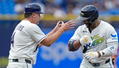 Tampa Bay Rays' Yandy Díaz celebrates his home run off Los Angeles Angels pitcher Walbert Ureña with third base coach Brady Williams (4) during the first inning of a baseball game Friday, May 29, 2026, in St. Petersburg, Fla. (AP Photo/Chris O'Meara)