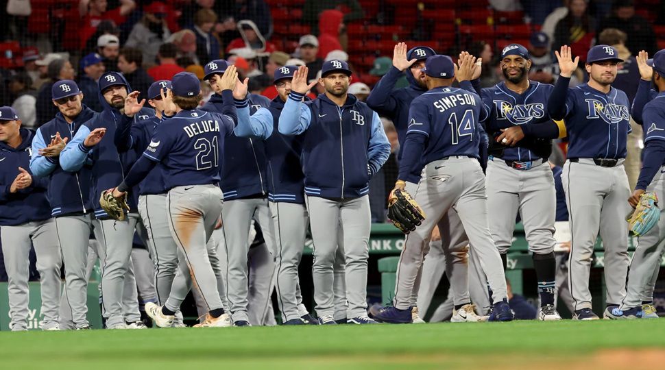 The Tampa Bay Rays celebrate their win over the Boston Red Sox in a baseball game, Thursday, May 7, 2026, in Boston. (AP Photo/Mark Stockwell)