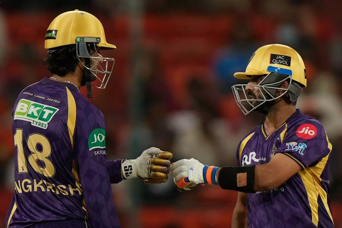 Kolkata Knight Riders'captain Ajinkya Rahane, right, and Angkrish Raghuvanshi, encourage each other as they bat during the Indian Premier League cricket match between Sunrisers Hyderabad and Kolkata Knight Riders in Hyderabad, India, Sunday, May 3, 2026. (AP Photo/Mahesh Kumar A.)