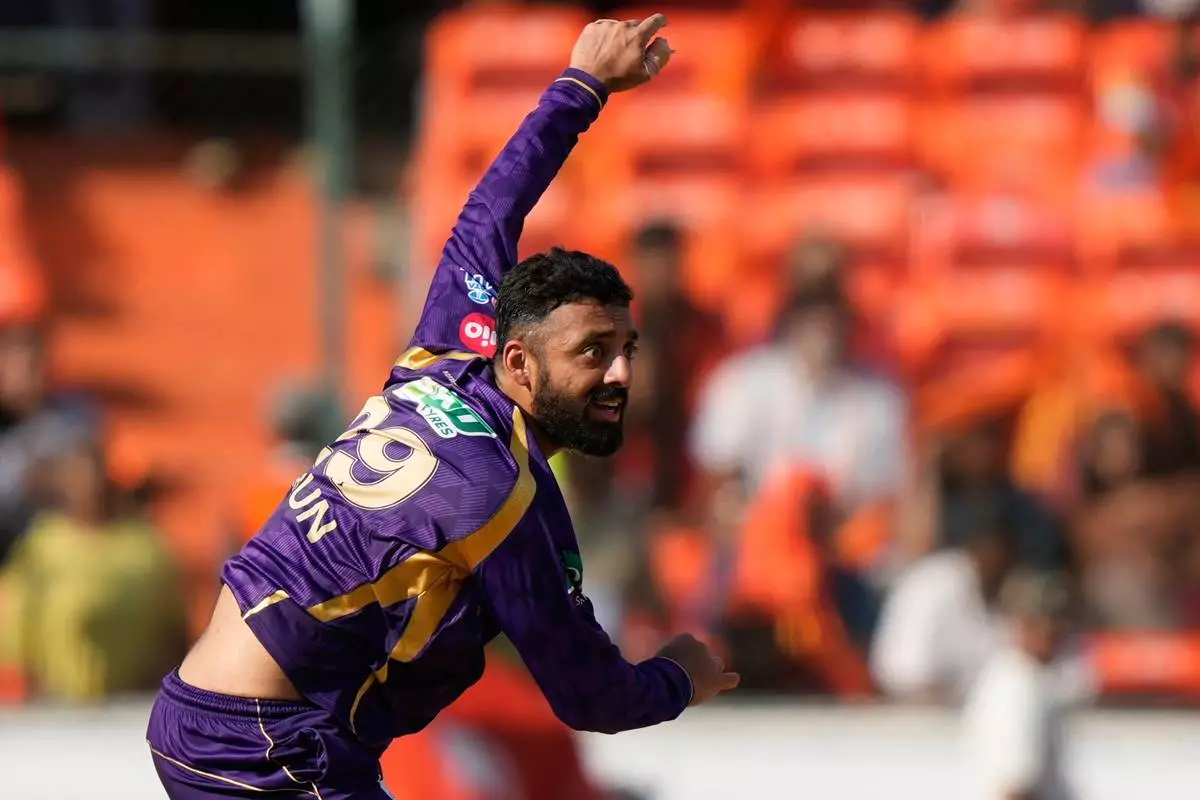 Kolkata Knight Riders' Varun Chakaravarthy bowls a delivery during the Indian Premier League cricket match between Sunrisers Hyderabad and Kolkata Knight Riders in Hyderabad , India, Sunday, May 3, 2026. (AP Photo/Mahesh Kumar A.)