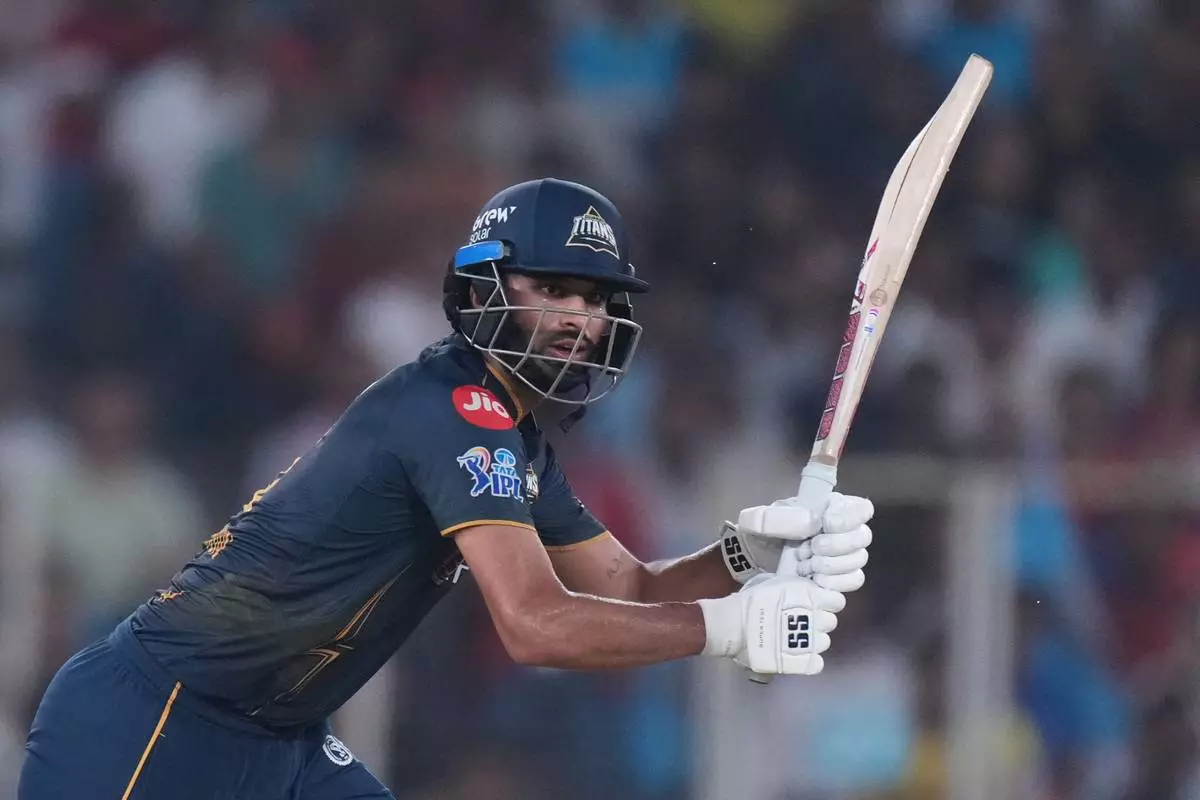 Gujarat Titans' Washington Sundar plays a shot during the Indian Premier League cricket match between Gujarat Titans and Punjab Kings in Ahmedabad, India, Sunday, May 3, 2026. (AP Photo/Ajit Solanki)