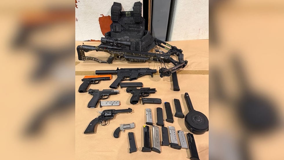 During the investigation, detectives said they recovered five firearms, a crossbow, a pepper...