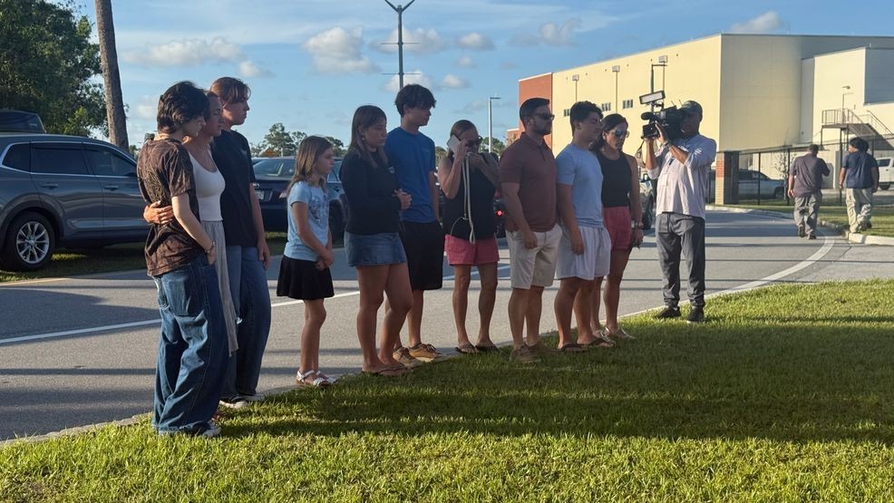 Christopher's best friends leaned on each other as they come to terms with his sudden death. (WPEC)