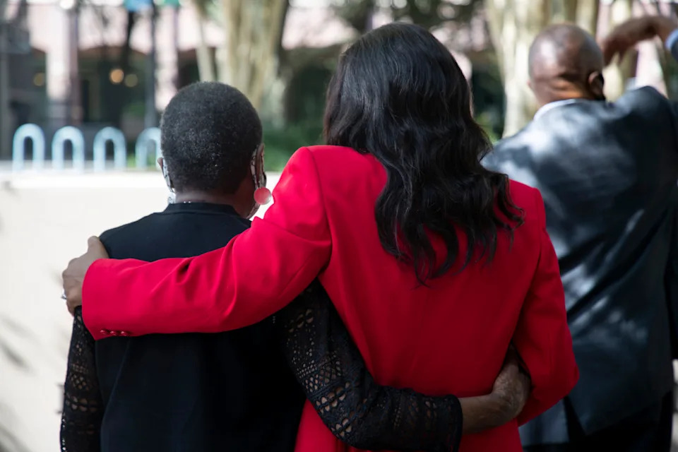 Former mayor Dorothy "Dot" Inman-Johnson, Tallahassee's first African-American woman city commissioner and Mayor Pro Tem Dianne Williams-Cox, Tallahassee's second African-American woman city commissioner, hug after the park in Kleman Plaza was dedicated to Inman-Johnson Monday, Oct. 26, 2020. 