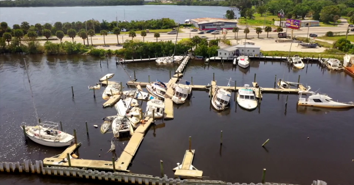Old Bridge Marina cleanup begins after boats left mangled since Hurricane Ian | Lee County
