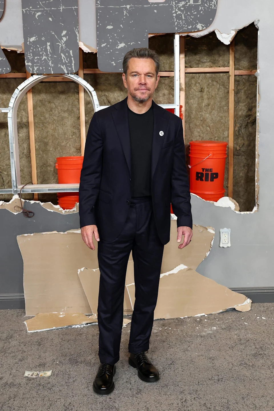 Matt Damon standing at the Netflix The Rip New York premiere at Alice Tully Hall