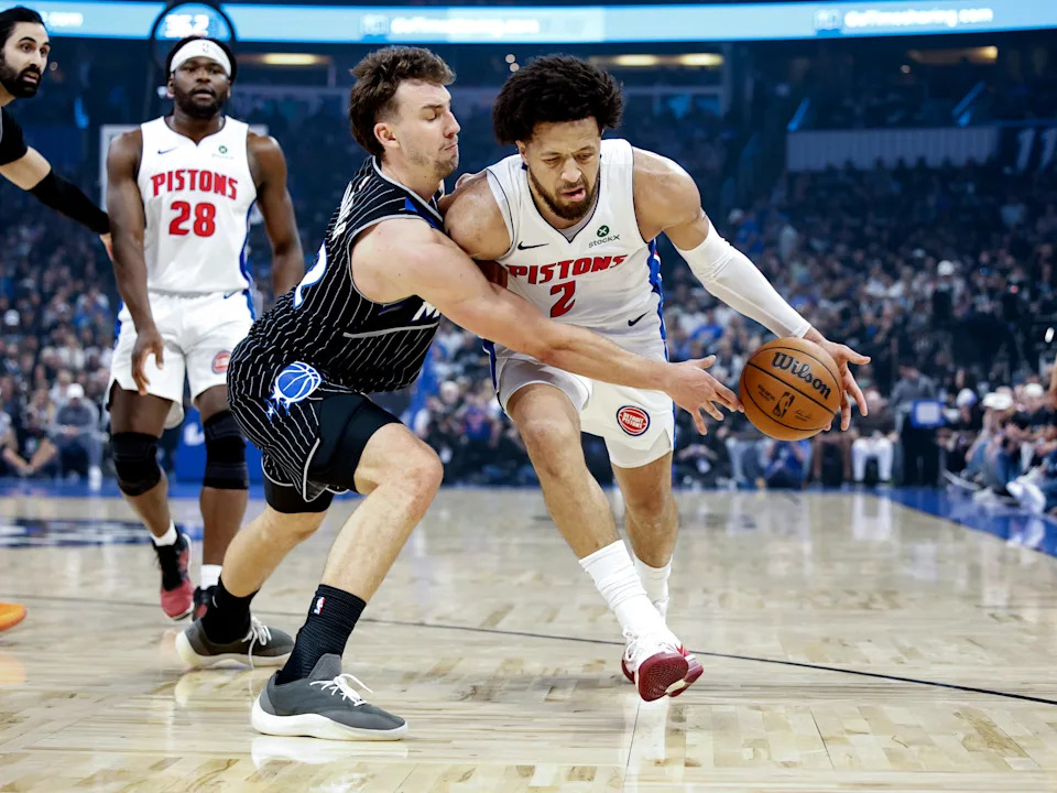 Detroit Pistons guard Cabe Cunningham is closely defended by Franz Wagner, forward for the Orlando Magic, during the first half of Game 3 of the first round of the Eastern Conference playoffs at the Kia Center on April 25, 2026 in Orlando.