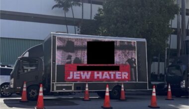 a mobile billboard is depicted in a city