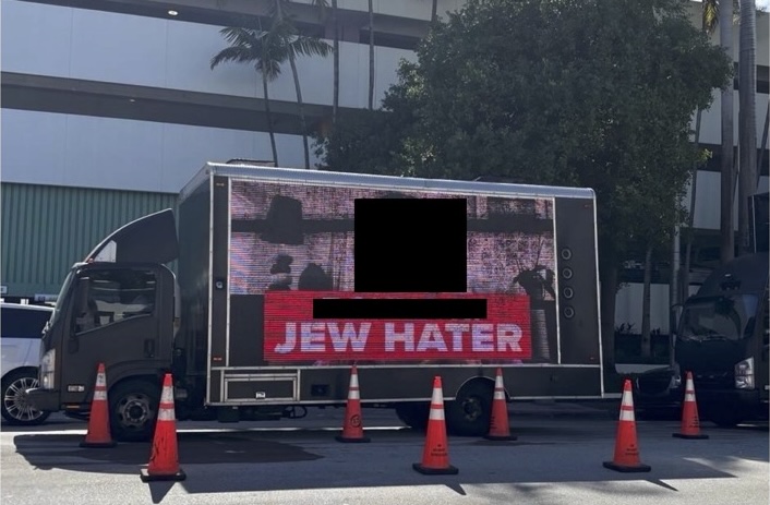 a mobile billboard is depicted in a city