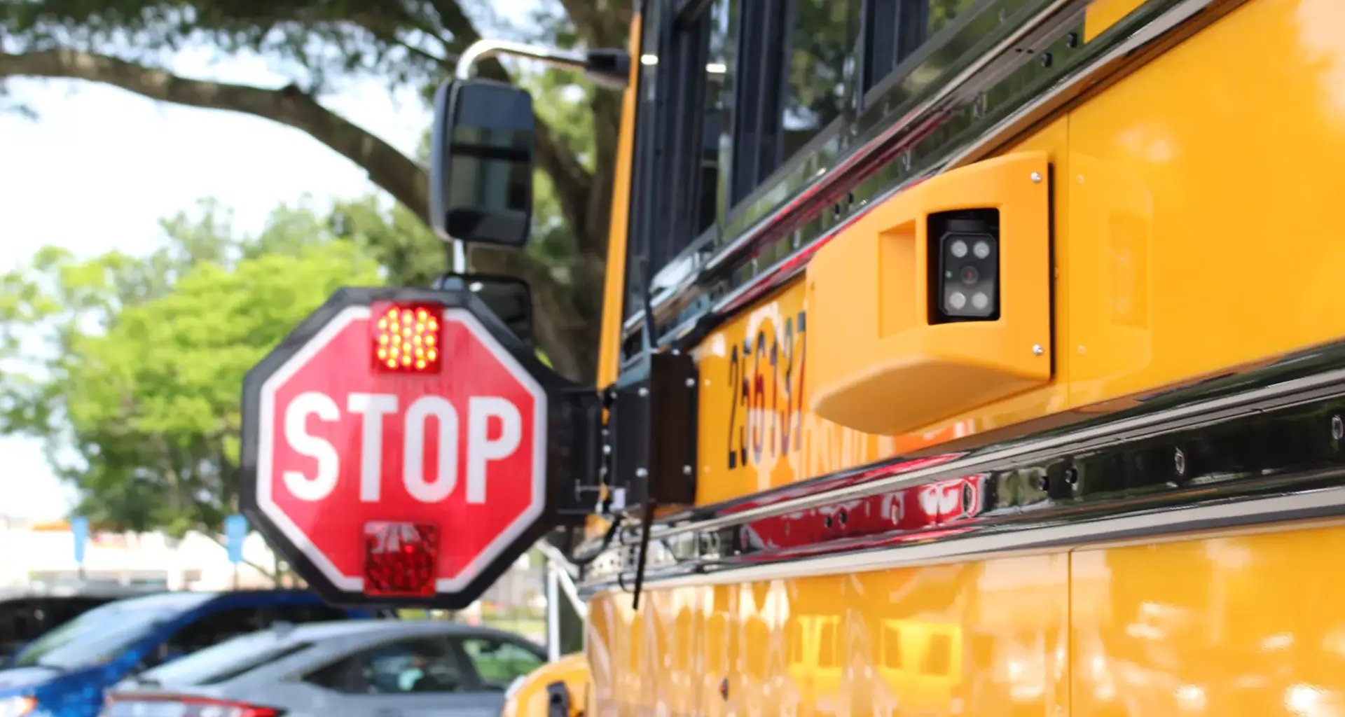 Closeup of stop sign on school bus.