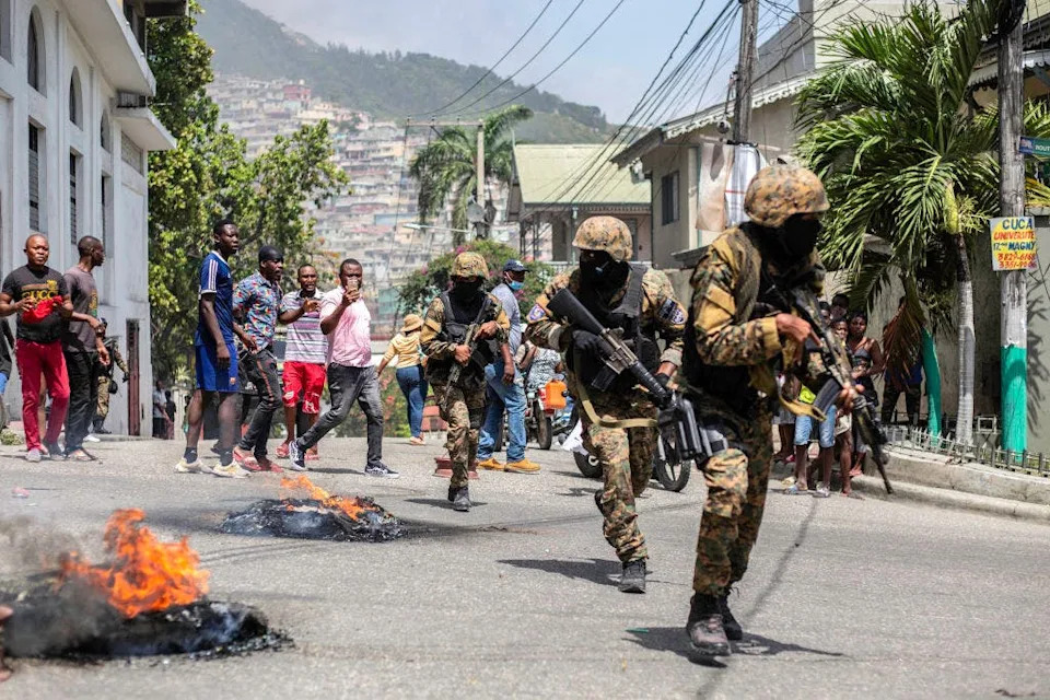 Citizens protesting near Petion Ville police station in Port-au-Prince