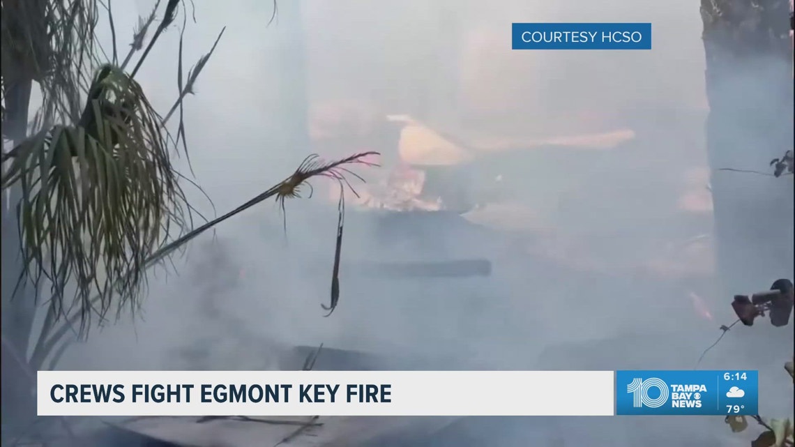 Crews fight a fire on Egmont Key on Sunday