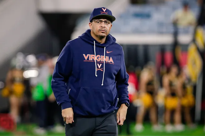 Dec 27, 2025; Jacksonville, FL, USA; Virginia Cavaliers head coach Tony Elliott looks on before the Gator Bowl against the Missouri Tigers at EverBank Stadium. Mandatory Credit: Travis Register-Imagn Images