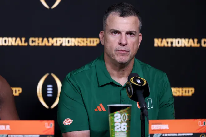 MIAMI GARDENS, FLORIDA - JANUARY 19: Head coach Mario Cristobal of the Miami Hurricanes is interviewed during the post- game press conference after losing to the Indiana Hoosiers 27-21 in the 2026 College Football Playoff National Championship at Hard Rock Stadium on January 19, 2026 in Miami Gardens, Florida. (Photo by Ishika Samant/Getty Images)