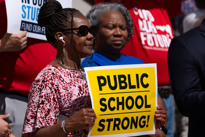 Florida educators, parents and others gather on the steps of the Florida Historic Capitol to voice their opinions for better support of public schools Tuesday, May 5, 2026.
