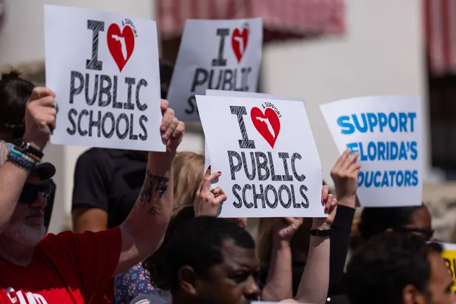 Florida educators, parents and others gather on the steps of the Florida Historic Capitol to voice their opinions for better support of public schools Tuesday, May 5, 2026.