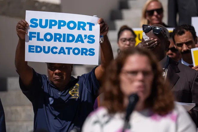 Florida educators, parents and others gather on the steps of the Florida Historic Capitol to voice their opinions for better support of public schools Tuesday, May 5, 2026.