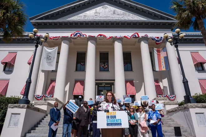 Florida educators, parents and others gather on the steps of the Florida Historic Capitol to voice their opinions for better support of public schools Tuesday, May 5, 2026.