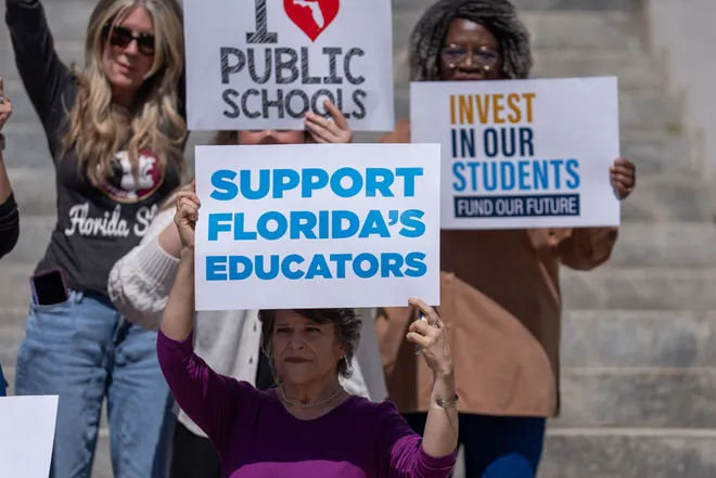 Florida educators, parents and others gather on the steps of the Florida Historic Capitol to voice their opinions for better support of public schools Tuesday, May 5, 2026.