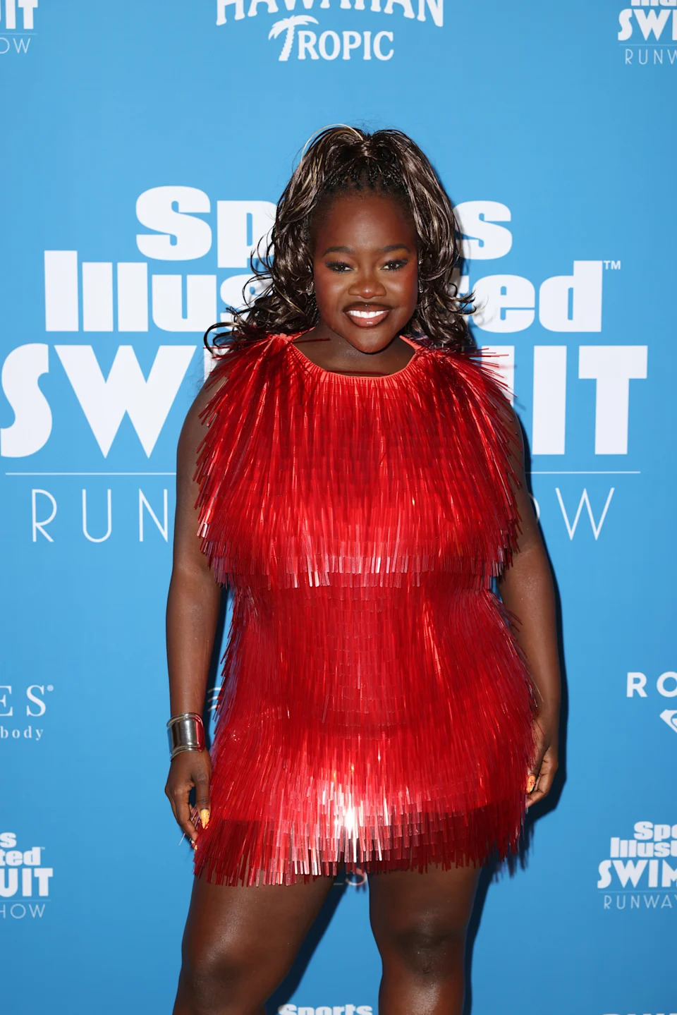 Achieng Agutu attends Sports Illustrated Swimsuit Runway Show.