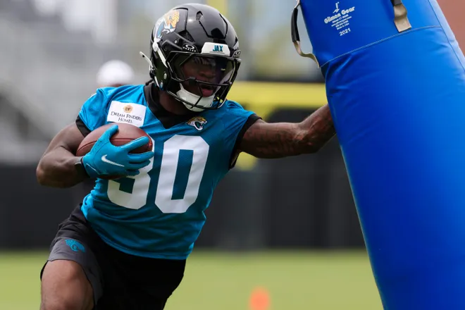 Jacksonville Jaguars running back J'Mari Taylor (30) hits a blocking pad during rookie minicamp at the Miller Electric Center, Saturday, May 9, 2026 in Jacksonville, Fla. Today was the second of a three day camp concluding Sunday.