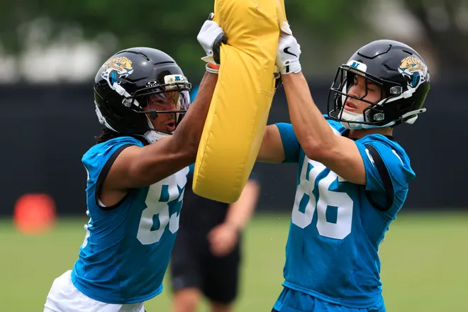 Jacksonville Jaguars wide receiver Ben Patterson (83), left, and wide receiver Trebor Peña (86) drill during rookie minicamp at the Miller Electric Center, Saturday, May 9, 2026 in Jacksonville, Fla. Today was the second of a three day camp concluding Sunday.