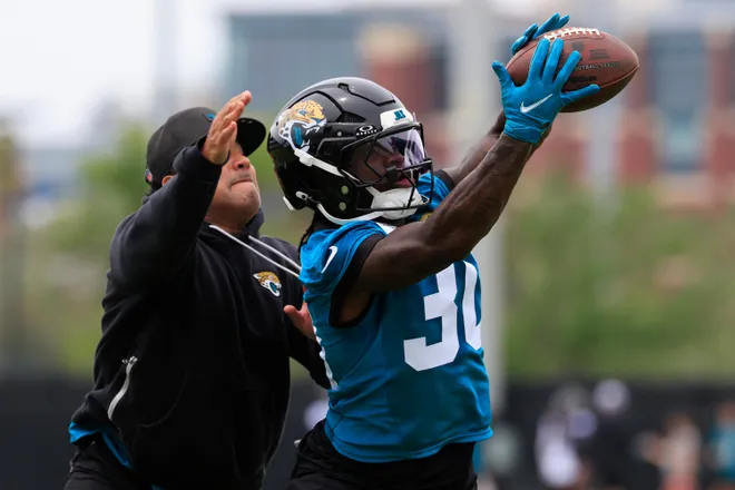 Jacksonville Jaguars running back J'Mari Taylor (30) catches a contested pass during rookie minicamp at the Miller Electric Center, Saturday, May 9, 2026 in Jacksonville, Fla. Today was the second of a three day camp concluding Sunday.